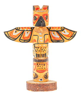 Miniature colorful wooden thunderbird totem pole