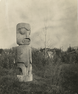 Totem marker sits in a field